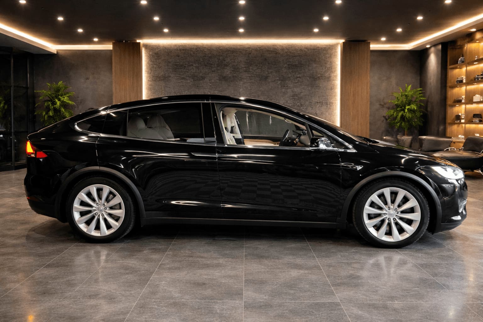 Tesla Model X noire | vue profil, véhicule premium Taxi JB Sens